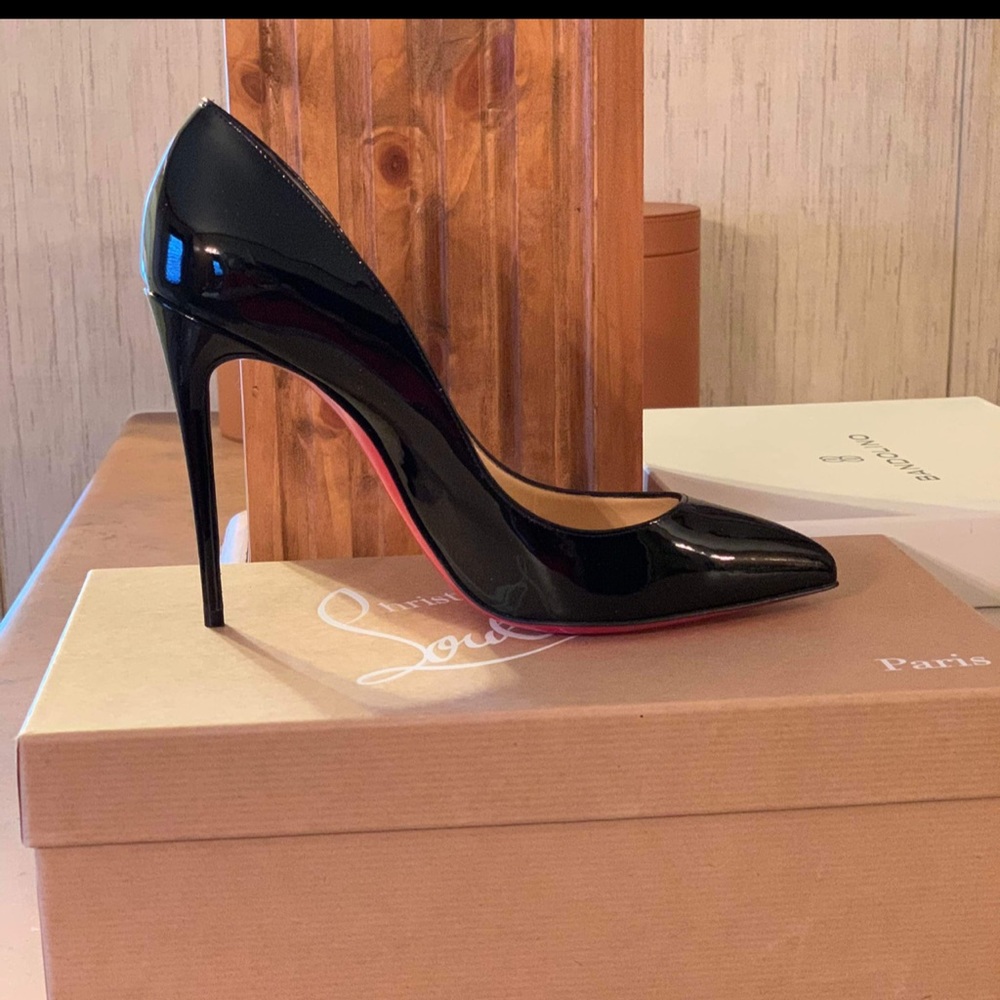 Red bottoms, size 7 never worn with replacement heel stubs.